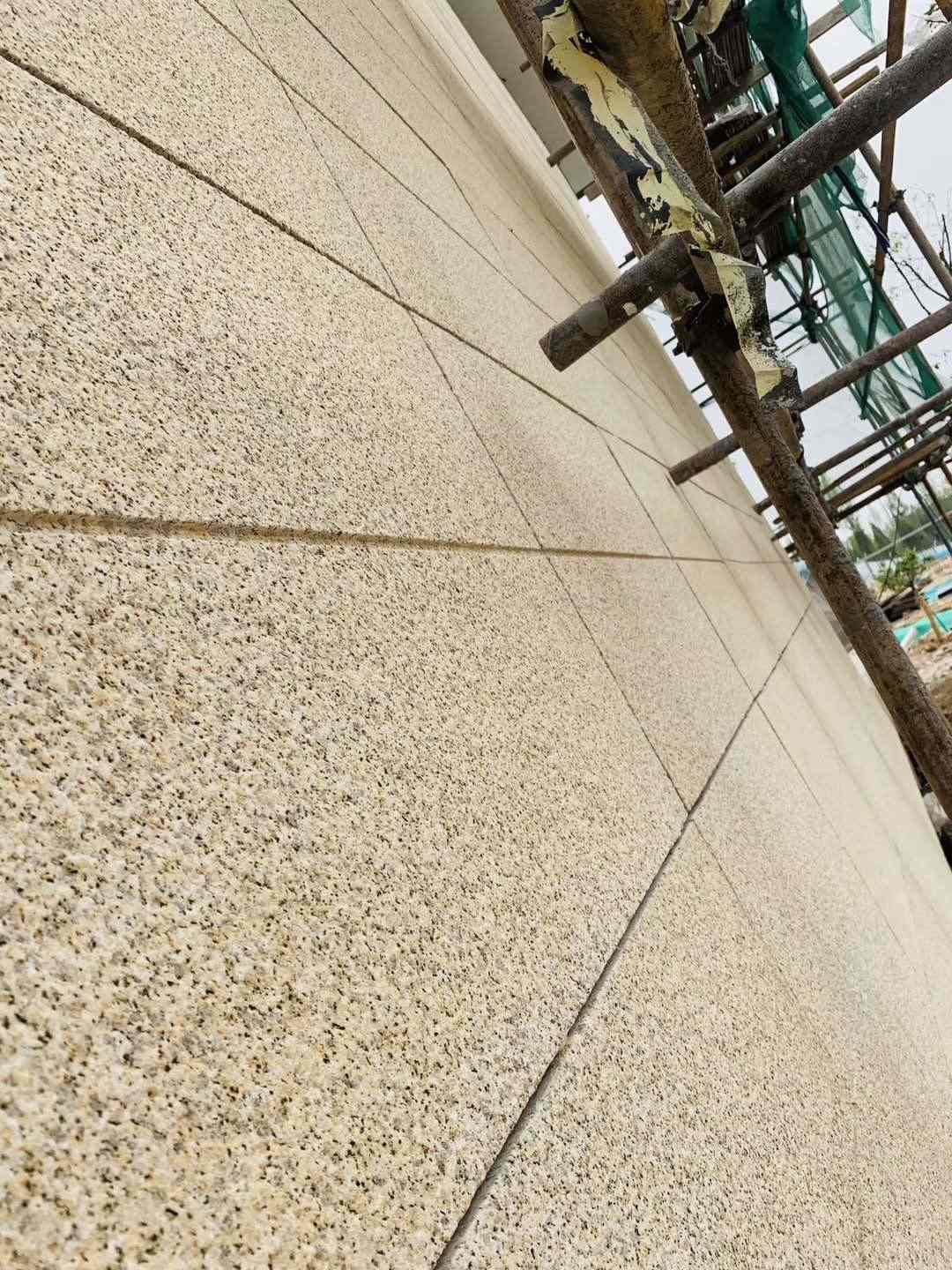 乌兰察布 黄金麻花岗岩荔枝面外墙干挂石材效果示例